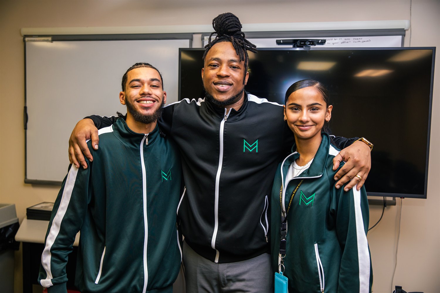 MiMiroir team wearing branded tracksuits